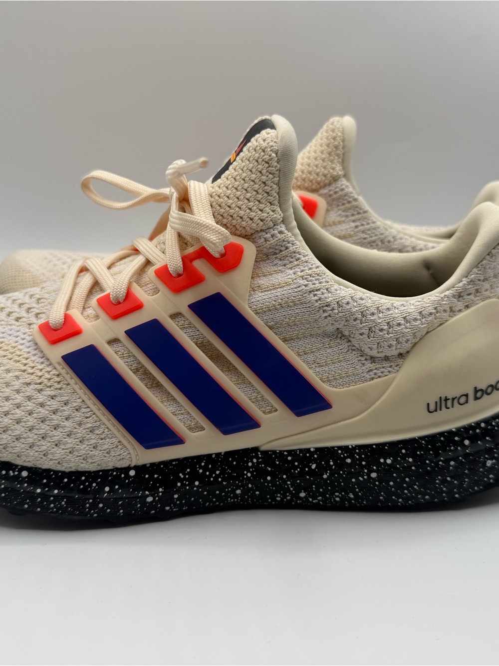 adidas mens Sneakers in Cream with Blue and Coral Accents